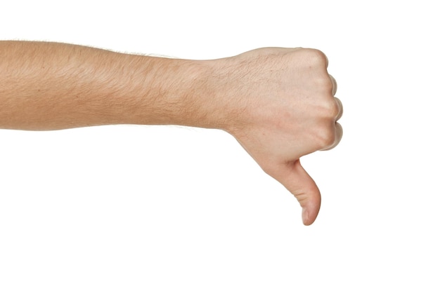 Photo male hand showing thumbs down on white background