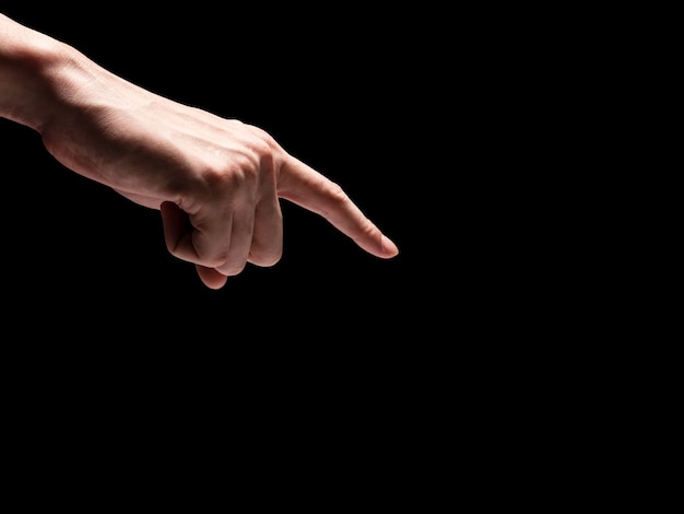 Male hands on a black background