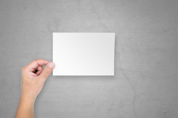 Male hands holding a blank paper