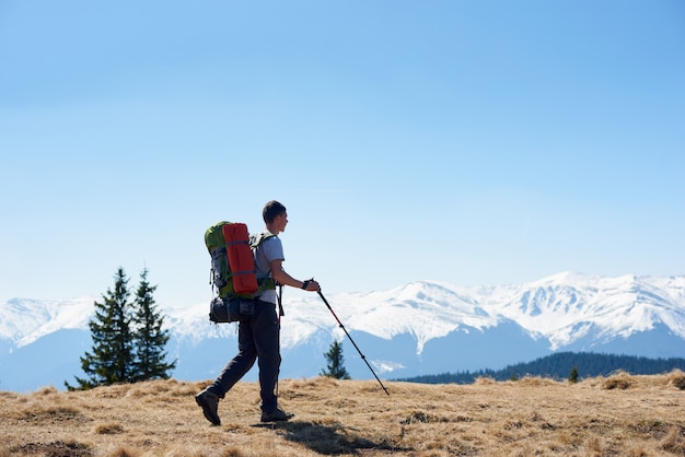 Male hiker with hiking equipment