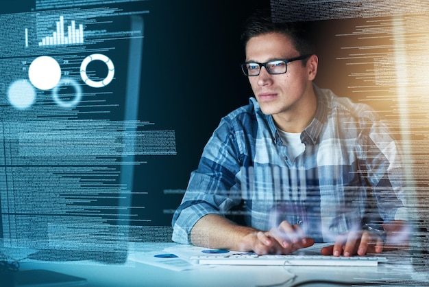 Male it computer worker working on a future hologram cgi screen at his office desk Tech designer using technology to test new abstract and innovation data Web developer work on a digital code