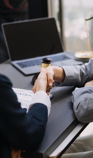 Male lawyer working with contract papers and wooden gavel on tabel in courtroom justice and law attorney court judge concept