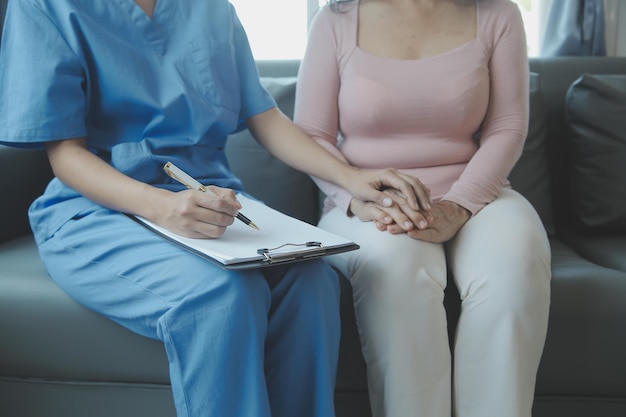 Male patient having consultation with doctor or psychiatrist who working on diagnostic examination on men's health disease or mental illness in medical clinic or hospital mental health service center