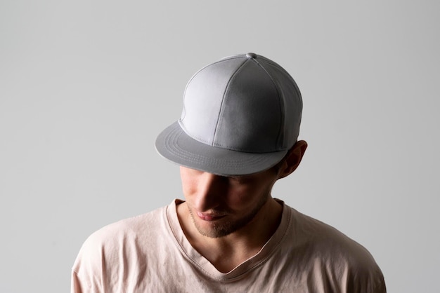 Male person wearing blank simple baseball snapback hat mockup copy space template