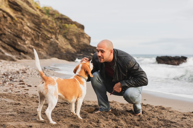 Male playing with dog