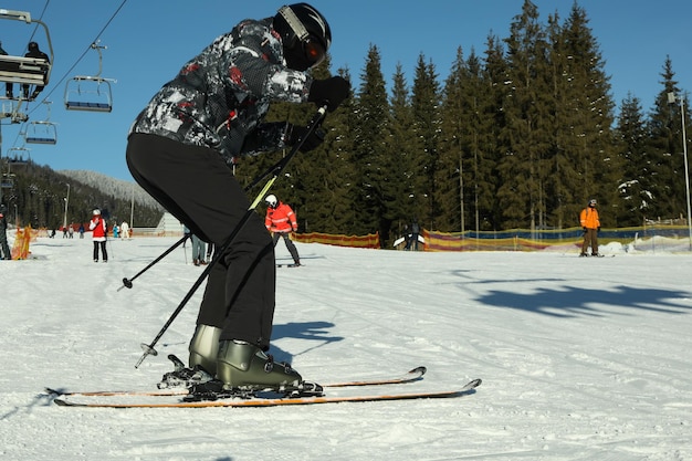 Male skier ride on ski slope ski season