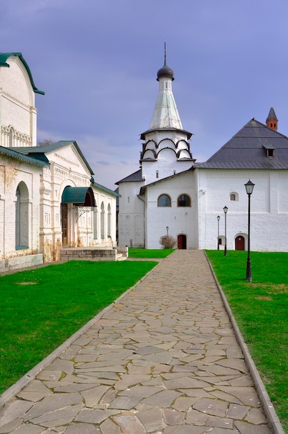 The male SpasoEvfimiev Monastery The path to the Assumption Refectory Church a monument of Russian architecture of the XVI century Suzdal Russia 2022