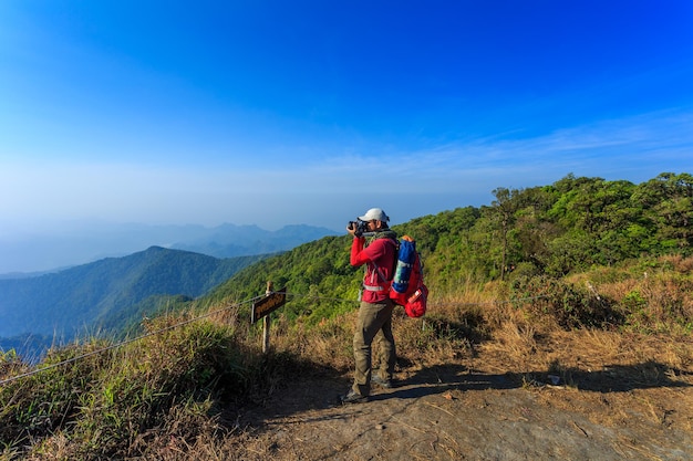 Male tourists go hiking in Khao Laem National Park Kanchanaburi Thailand