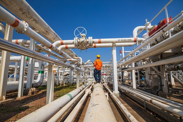 Male worker inspection at valve of visual check record pipeline oil and gas