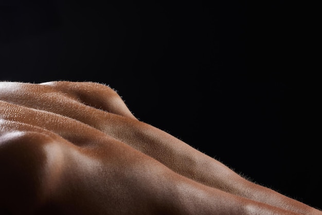 Photo man back and sweat on athlete skin in workout exercise or body builder with strong muscle in pushup in closeup dark background and texture of anatomy of person with fitness or training in macro