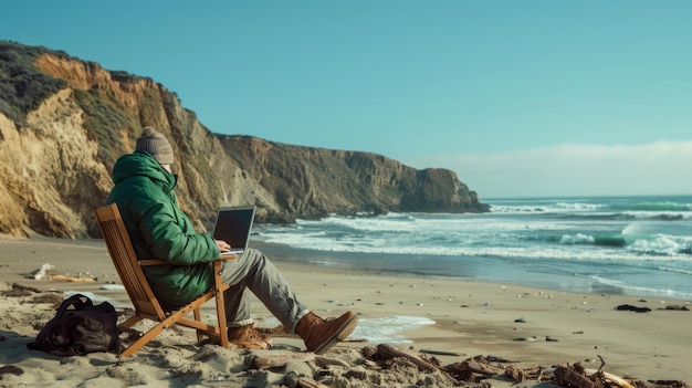 The man on beach with laptop