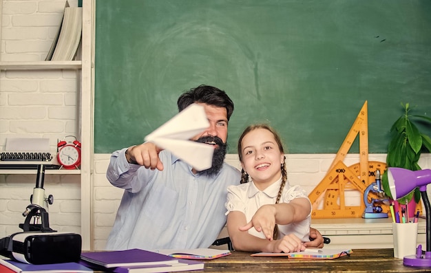 Man bearded pedagogue and pupil having fun School learners leisure Developing caring learners who are actively growing and achieving Creating a community of learners Teacher and schoolgirl