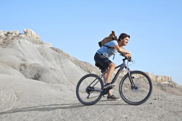 man on a bike on a mountain