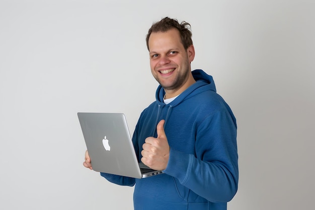 a man in a blue hoodie with a thumb up