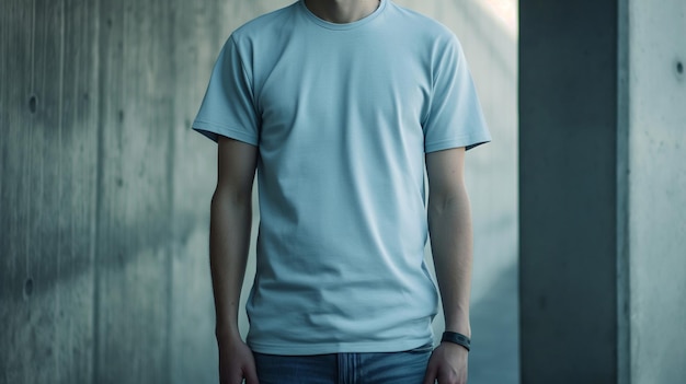 a man in a blue shirt stands in front of a wall