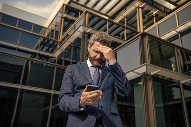 Man boss has conversation business negotiation having problem adult ceo with cellphone