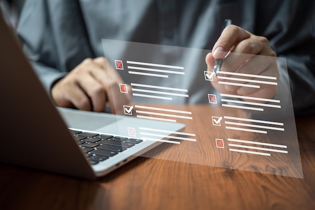 man chooses questionnaire with checkbox survey form online answer questions in the exam of test business checklist and filling survey form online using technology for education learning