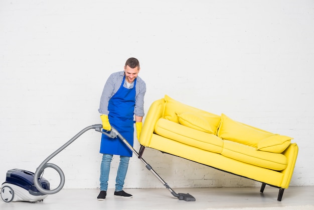 Man cleaning his home