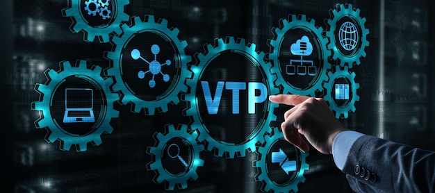 The man clicks on the inscription VTP VLAN Trunking Protocol Virtual Local Area Network