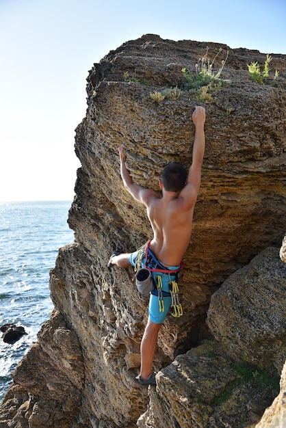 Man climbing on a rock