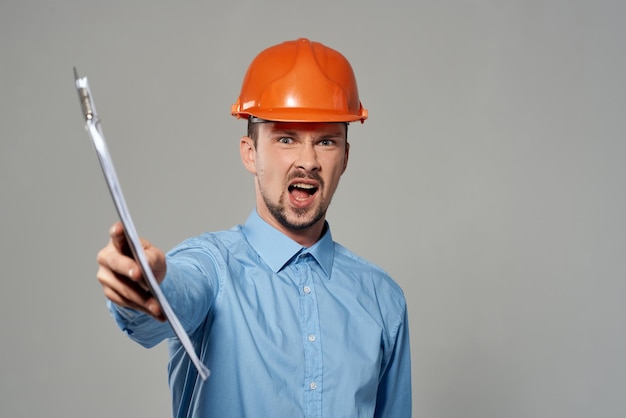 Man in construction uniform protection isolated background