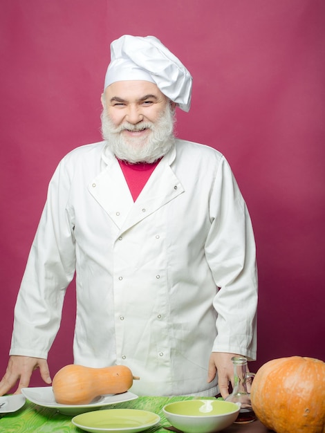 Man cook with pumpkins