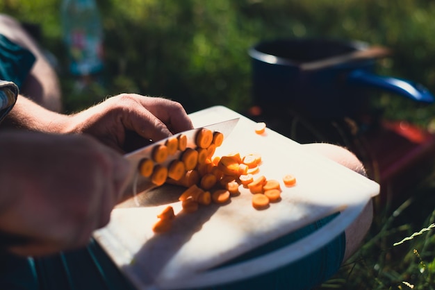 Man cooking in nature natural photo