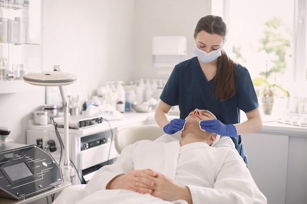 Man in cosmetologist cabinet has a skincare procedure