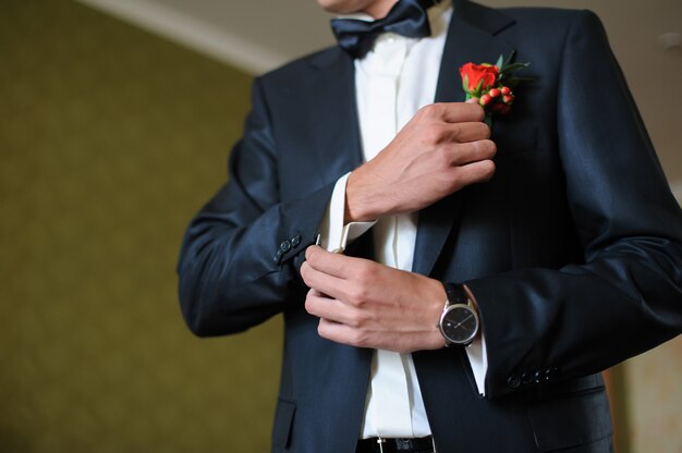 Man cufflink buttons on a white shirt