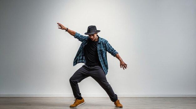 Photo man dancing street dance style over isolated white background