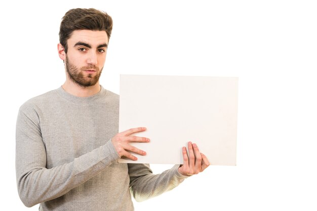 Photo the man demonstrating the blank paper on the white background