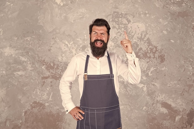 Man denim apron stylish barbershop staff bearded hipster spread inspiration concept