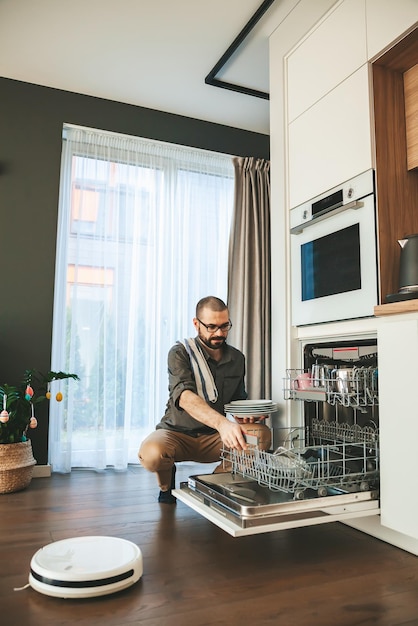 Man doing chores in the kitchen