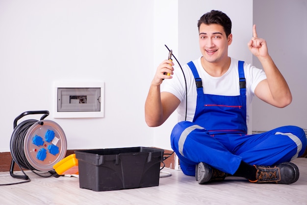 Man doing electrical repairs at home