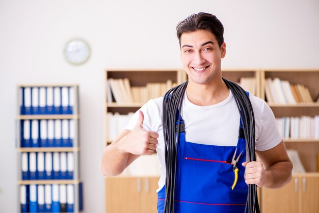 Man doing electrical repairs at home