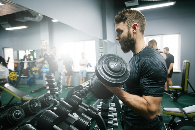 Man doing workout or training in the gym