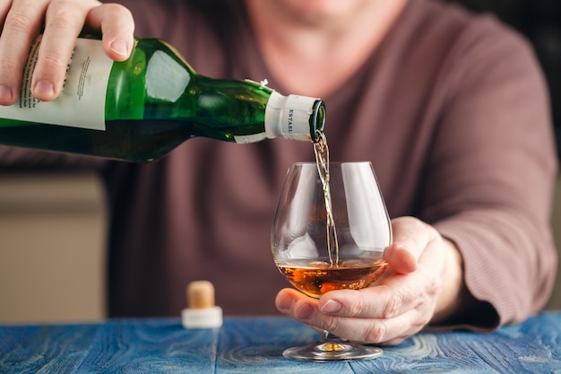 Man drinking malt whisky in relax time