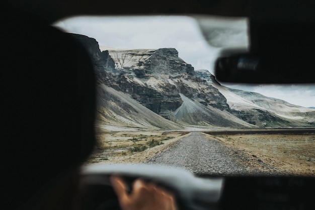 Man driving on a dirt road in Iceland