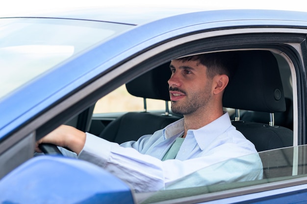 Man driving inside a car