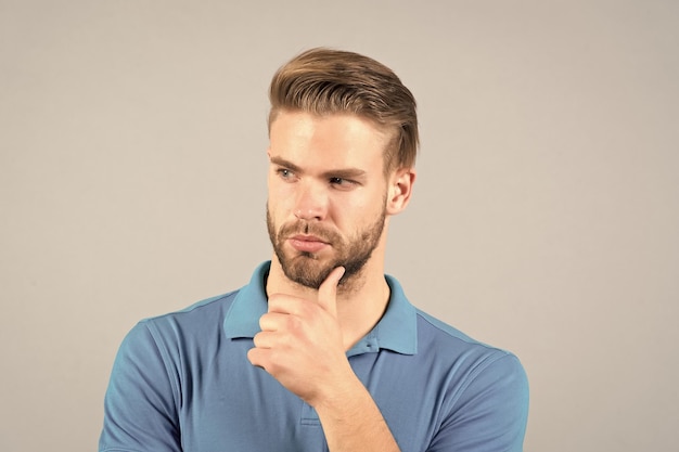 Man expertising face before shaving