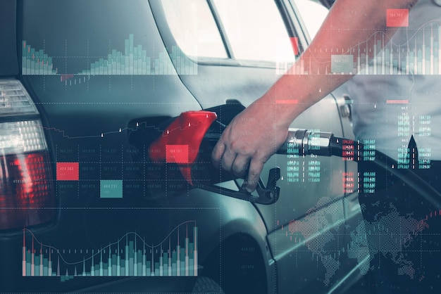 A man fills up a car at a gas station on technological background Graph of rising prices for gasoline and fuel