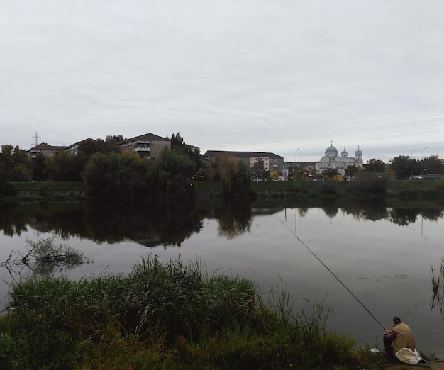 Man fishing in lake