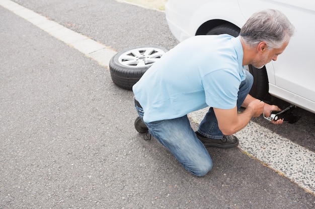 Man fixing tire