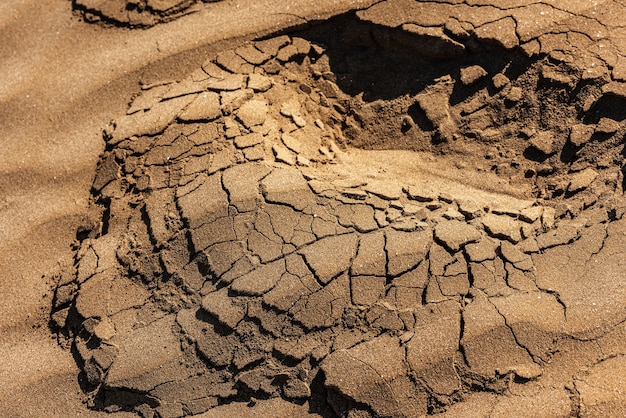 Man footprints on loose sand