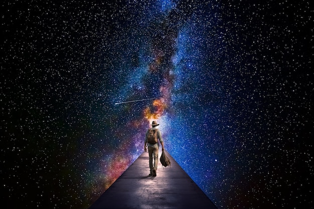 Man in front of the universe