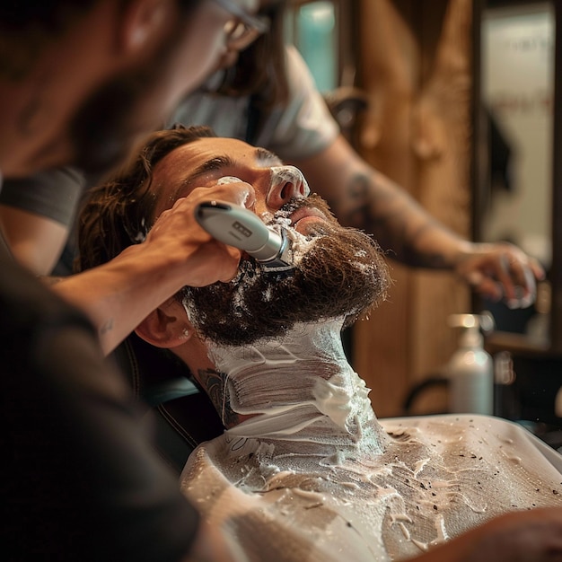 Photo a man getting his beard trimmed with a razor