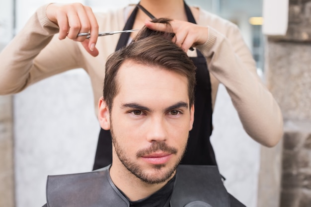 Man getting his hair trimmed