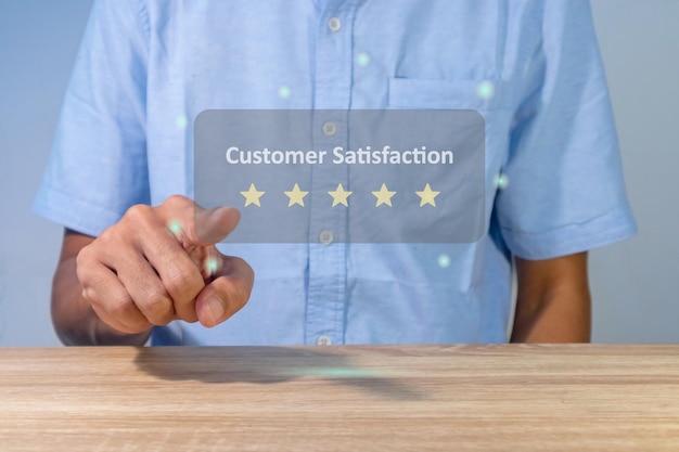 Photo a man gives rating to service experience on online application customer review satisfaction feedback concept