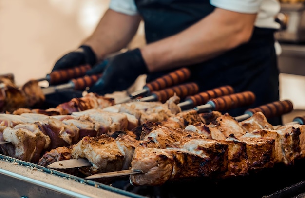 A man grilling meat on a grill