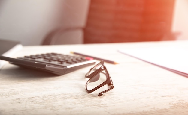 Man hand calculator with glasses